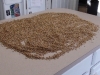 Conditioning the grain by spritzing with water. 