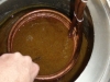 Stirring to cool wort quicker.  